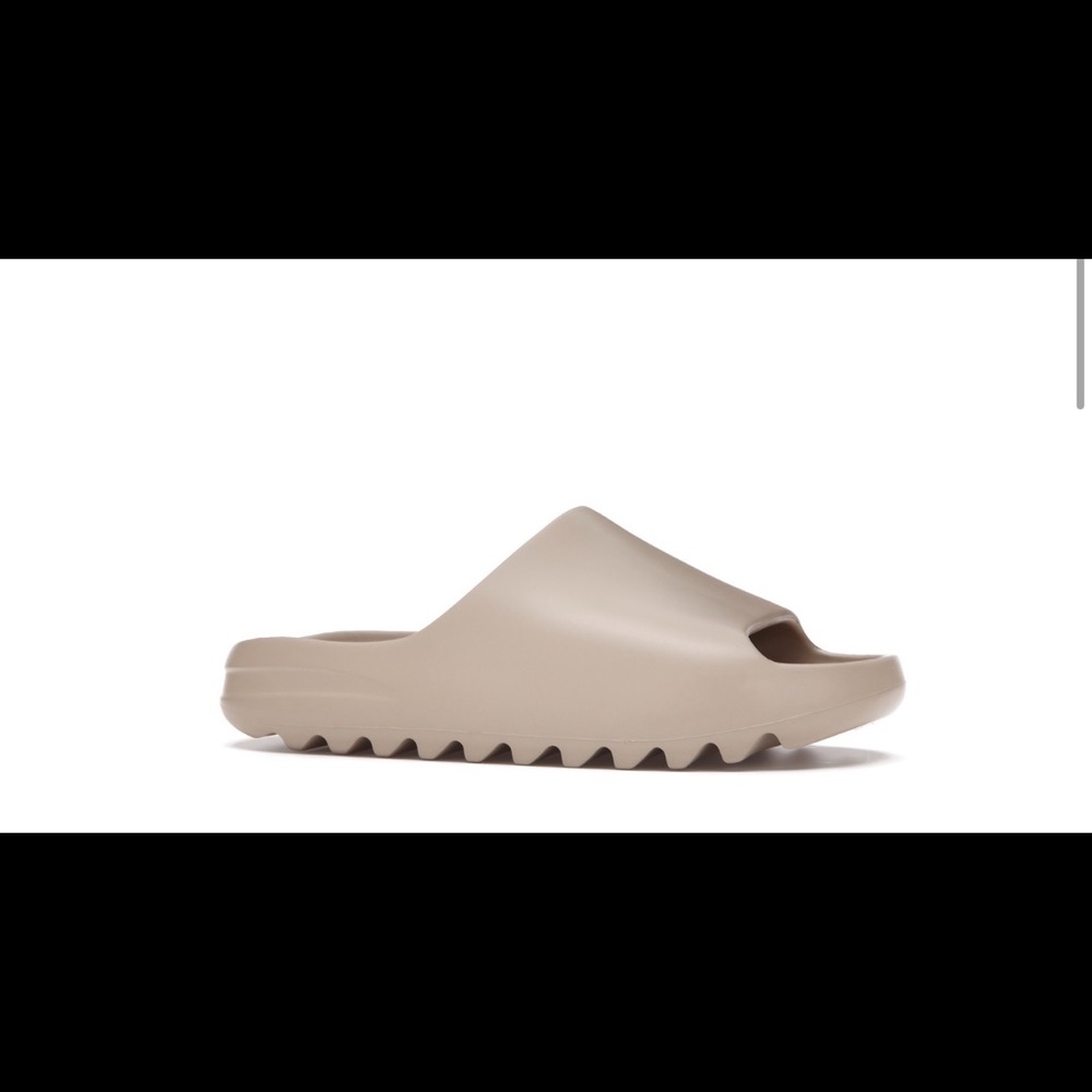 Yeezy Slides , Size 7 And In Color Pure - image 1